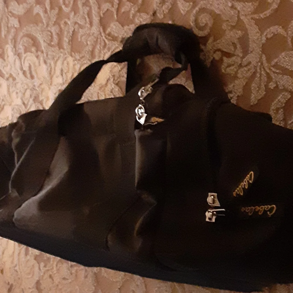 Cabela's black duffel bag gold embroidered logo 12